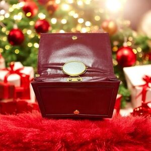 Vintage Lou Taylor Maroon Clutch with 360°
Flip Mirror